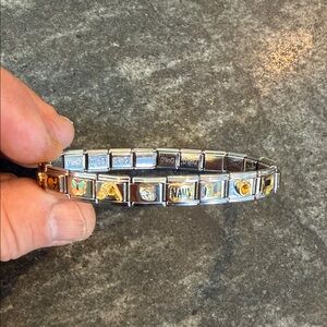 D’linq Silver and Gold Italian Charm Bracelet with a variety of tiles.